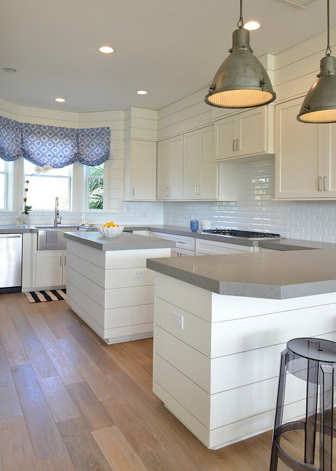 Thick Countertop. Quartz Thick Countertop. Kitchen with shiplap island and peninsula. The perimeter cabinets are shaker style and the thick countertop is a grey quartz. #Thickcountertop #thickquartzcountertop #countertop Munger Interiors