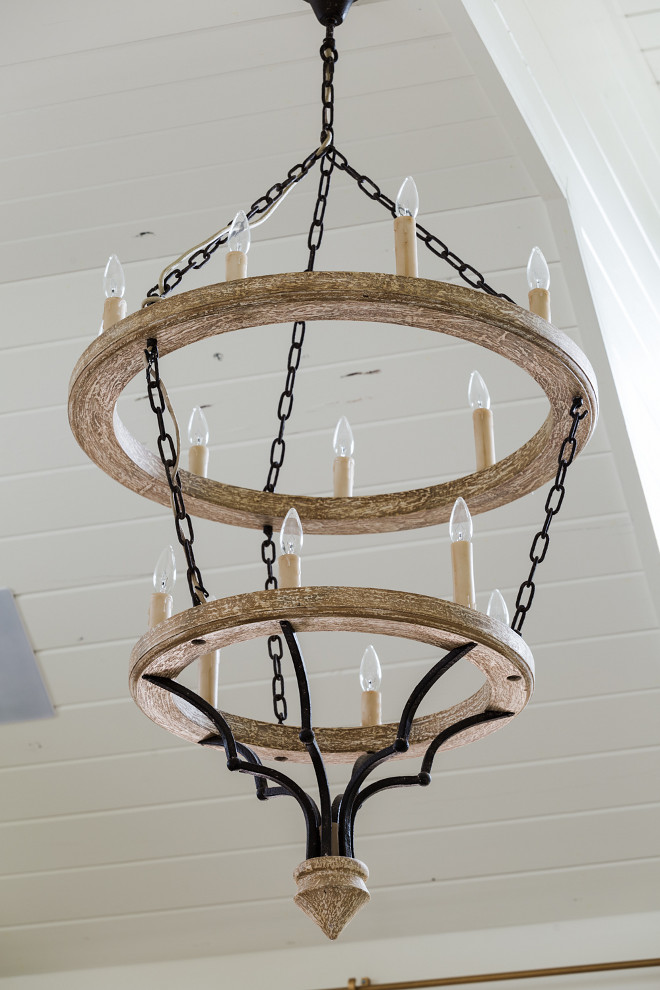 Two-tiered whitewashed wood chandelier. Shades of Light Countryside Elegance Tiered Chandelier A 2-tier chandelier of rusted iron and artistically distressed wood, this simple yet elegant design brings stately countryside elegance into the room. #twotieredchandelier #whitewashedwoodchandelier #Shadesoflight #CountrysideEleganceTieredChandelier