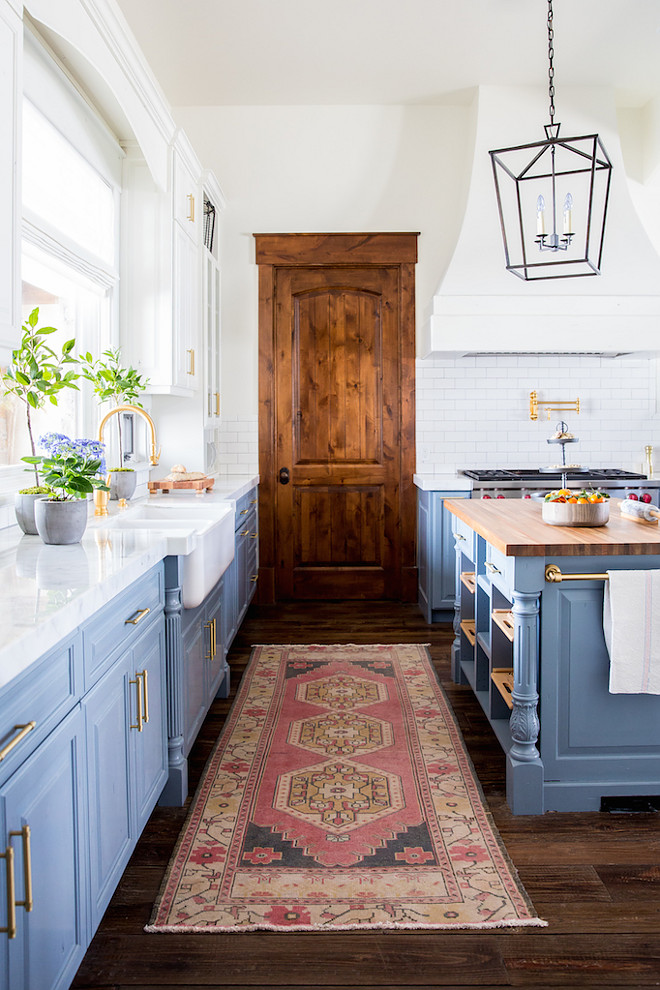 Vintage kilim runner. Kitchen runner. A vintage kilim runner adds a bit of bright color to the space. This is a favorite kitchen layer of mine that adds interest and warmth. #kilimrunner #kitchenkilimrunner #kitchenrunner #Vintagekilimrunner Becki Owens Becki Owens & Jamie Bellessa