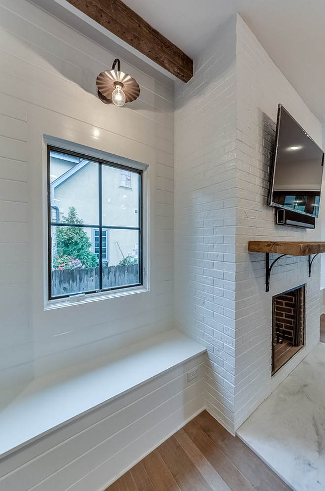 White Brick Fireplace. Farmhouse White Brick Fireplace. Farmhouse living room with white brick fireplace, reclaimed wood shelf with wrought iron brackets used as mantel and shilplap window-seats flanking the farmhouse-style fireplace. Farmhouse White Brick Fireplace Living room. Farmhouse White Brick Fireplace. Farmhouse White Brick Fireplace #FarmhouseWhiteBrickFireplace #FarmhouseFireplace #WhiteBrickFireplace #BrickFireplace #Farmhouse Picture Perfect House