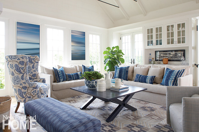 Blue and white living room. Coastal blue and white living room. A seat for everyone was the goal in the living room, where a pair of John Duckworth photographs stands in for views. Coastal blue and white living room #Coastalblueandwhitelivingroom #Coastallivingroom #blueandwhite #livingroom Nancy Serafini