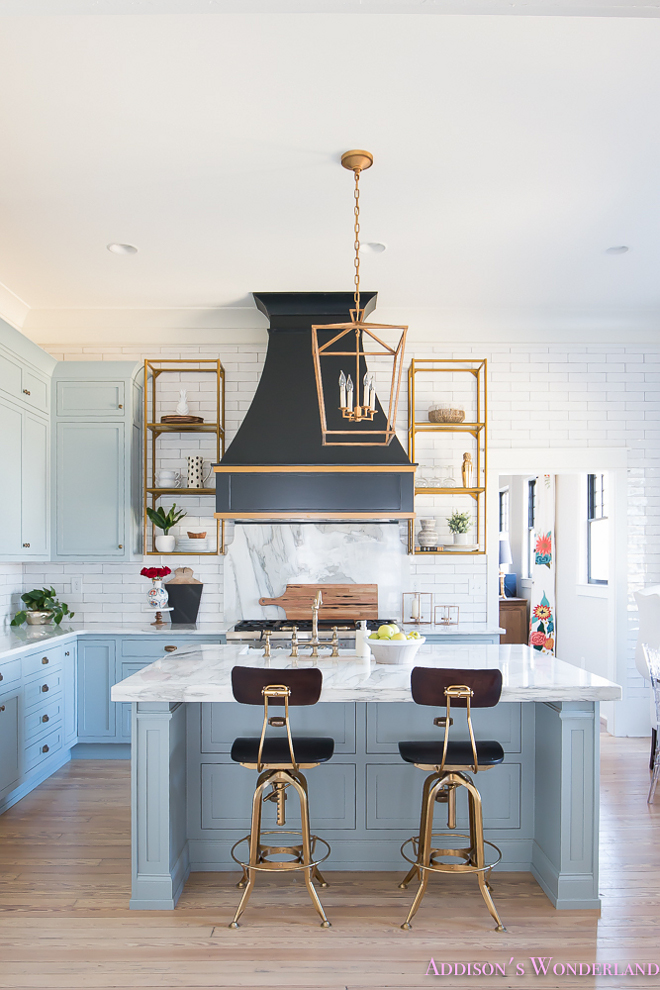 Blue kitchen with white marble countertop. The brass shelves are from Blackstocks. Blue kitchen with white marble countertop. Blue kitchen with white marble countertop. Blue kitchen with white marble countertop. Blue kitchen with white marble countertop. Blue kitchen with white marble countertop #Bluekitchenwithwhitemarblecountertop #Bluekitchen #whitemarblecountertop #whitemarble #countertop Home Bunch's Beautiful Homes of Instagram @addisonswonderland