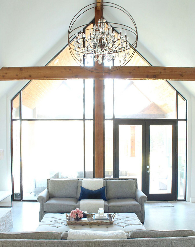 Cathedral Ceiling Window Ideas. Living room with Cathedral Ceiling and Floor to Ceiling Windows. Our living room features a cathedral ceiling, cedar wrapped beams, and a floor to ceiling Windows #CathedralCeiling #CathedralceilingWindow #WindowIdeas #Livingroom #CathedralCeiling #FloortoCeiling #Windows #cedarwrappedbeams #beams Beautiful Homes of Instagram @organizecleandecorate