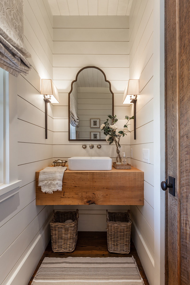 Farmhouse Bathroom with shiplap walls, floating wood slab vanity and Roman shades. Farmhouse Bathroom with shiplap walls, floating wood slab vanity and Roman shades #FarmhouseBathroom #bathroomshiplap #shiplap #floatingwoodslabvanity #floatingvanity #woodvanity #Romanshades Wright Design