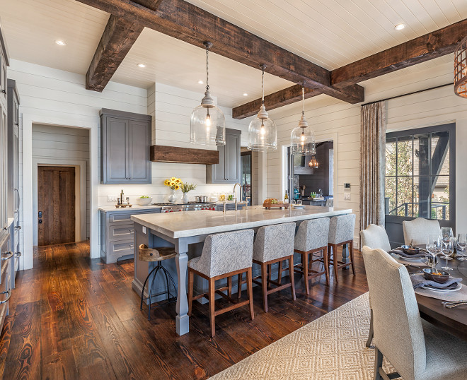 Grey Farmhouse Kitchen. Grey and white farmhouse kitchen with glass pendants. Grey and white Grey Farmhouse Kitchen. Grey kitchen with white shiplap farmhouse kitchen. Grey Farmhouse Kitchen. Grey and white Grey Farmhouse Kitchen. Grey kitchen with white shiplap farmhouse kitchen #Greykitchen #Greyandwhitekitchen #greyfarmhousekitchen #whiteshiplap #farmhousekitchen #glasspendants Wright Design