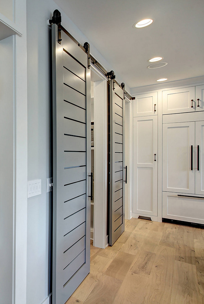 Kitchen Barn Door. Barn Door. Grey barn door. Grey barn door paint color is Sherwin Williams Classic French Gray. The sliding barn doors were custom. #KitchenBarnDoor #BarnDoor #Greybarndoor #barndoorpaintcolor #SherwinWilliamsClassicFrenchGray CVI Design