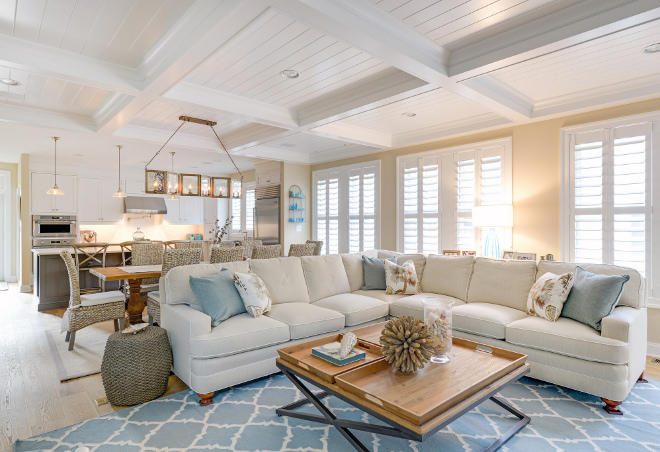 Open concept Coffered Ceiling. Area rug is by Surya and sectional is Sherrill Furniture. Open concept Coffered Ceiling Ideas. Open concept Kitchen Living Room Coffered Ceiling #Openconcept #CofferedCeiling #KitchenCofferedCeiling #LivingroomCofferedCeiling Echelon Custom Homes
