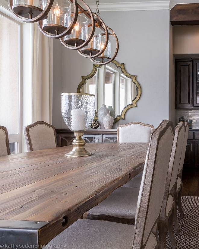 Rustic Farmhouse Table. Rustic wood and metal dining table is by Noir furniture and the upholstered chairs, in natural linen, are by Gabby Home. Rustic Farmhouse Table. Rustic Farmhouse Table. Rustic Farmhouse Table. Rustic Farmhouse Table #RusticTable #FarmhouseTable Restyle Design, LLC.