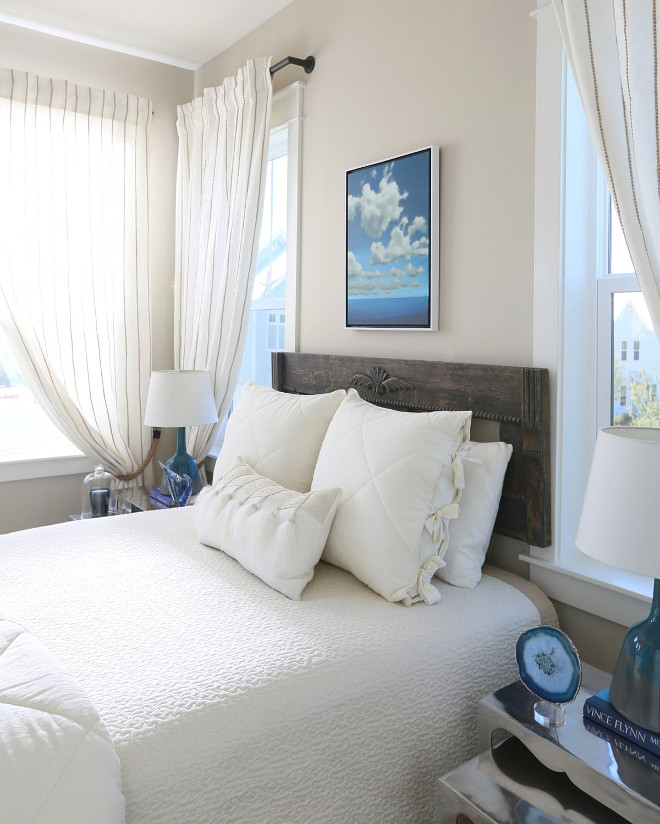 Small Bedroom. Small Bedroom Decor. The guest bedroom was designed for a soothing effect with greys, blues and white decor. The designer found the antique headboard (formally a footboard) at a local shop. Small Bedroom Bedding Ideas. Neutral Small Bedroom. #SmallBedroom #SmallBedrooms #SmallBedroomDecor # BeddingIdeas #NeutralSmallBedroom #NeutralBedroom #SmallBedroom JoAnn Regina Home