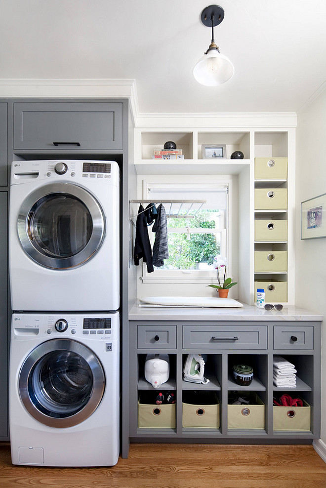 Small Laundry Room Space ideas. Stacked machines laundry room. Grey cabinet paint color is Sherwin Williams Cityscape #SmallLaundryRoom #LaundryRoom #SmallLaundryRoomSpace #SmallLaundryRoomSpaceideas #Stackedmachines #laundryrooms #Greycabinet #paintcolor #SherwinWilliamsCityscape Jessica Risko Smith Interior Design