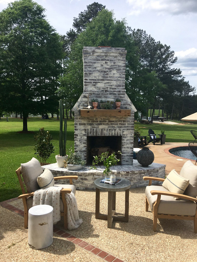 Whitewashed Outdoor Brick Fireplace. Whitewashed Outdoor Brick Fireplace. Chairs are from Joss and Main, pillows are Pottery Barn. Whitewashed Outdoor Brick Fireplace. Whitewashed Outdoor Brick Fireplace. Whitewashed Outdoor Brick Fireplace #WhitewashedOutdoorBrickFireplace #OutdoorBrickFireplace #WhitewashedBrickFireplace Beautiful Homes of Instagram @cindimc.ivoryhome