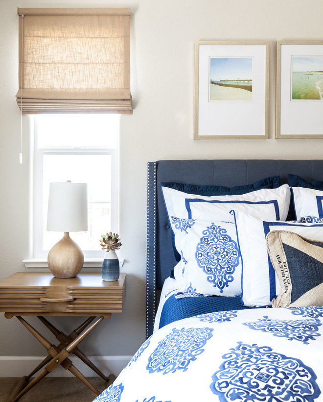 Blue and white Bedding. pottery barn duvet covers, with the medallion one and the solid white with navy banding under it. The solid blue blanket & solid blue shams are Ralph Lauren. Wall color is Coventry Gray (HC-169) by Benjamin Moore. #Wall #color #CoventryGray #HC169 #BenjaminMoore #blueandwhite #bedding Juxtaposed Interiors