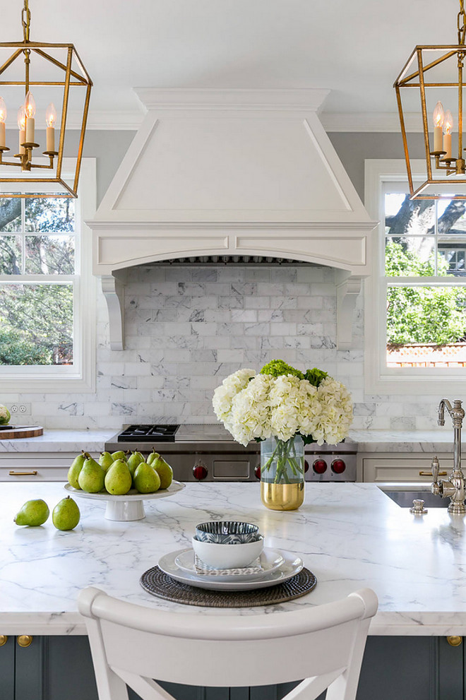 Cararra marble. Kitchen Cararra marble. Cararra marble. The countertop is a slab of honed Cararra marble. The backsplash tile is a 3 x 6 honed Cararra marble tile. Walker Zanger Cararra marble. #Cararramarble Christine Sheldon Design