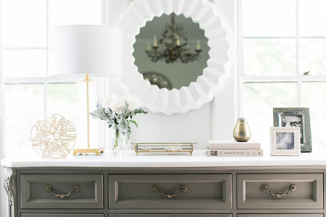 Console Vignette Ideas. The dresser was my mother’s. I painted it a grey chalk paint and went to the remnant yard to find a piece of rhino quartz for the top. It has a beautiful creamy look to it and was a very inexpensive upgrade. It is topped with a Serena and Lily mirror and lamp from Wayfair. Console Vignette Ideas. Grey Console with neutral Vignette. Console Vignette Ideas #ConsoleVignetteIdeas #console #VignetteIdeas Home Bunch Beautiful Homes of Instagram @finding__lovely
