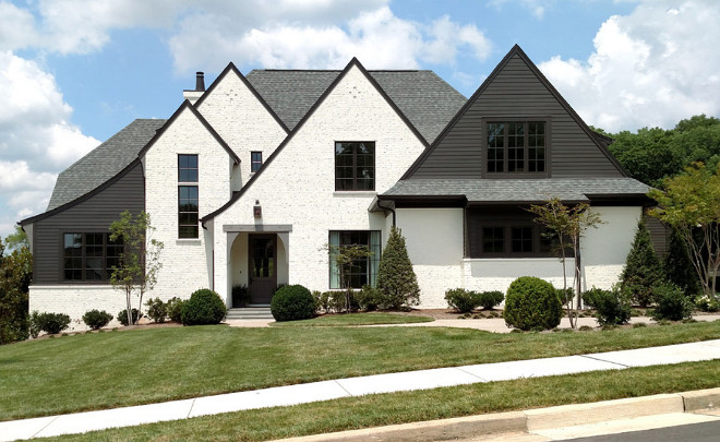 Black and white exterior. Black and white exterior paint color. White paint color is Benjamin Moore White Dove and Black paint color is Sherwin Williams SW 7069 Iron Ore #Blackandwhiteexterior #Blackandwhite #exteriorpaintcolor #Whitepaintcolor #BenjaminMooreWhiteDove #Blackpaintcolor #SherwinWilliamsSW7069IronOre C Kevin Coffey Dwellings 