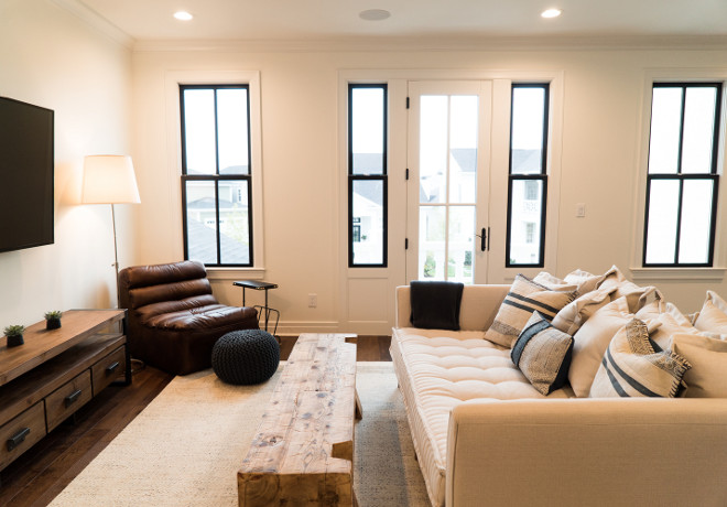 Family Room. Second floor family room. Second floor family room with comfy furniture and black windows #FamilyRoom #Secondfloorfamilyroom #upstairsfamilyroom #comfyfurniture #farmilyroomfurniture #blackwindows Ramage Company
