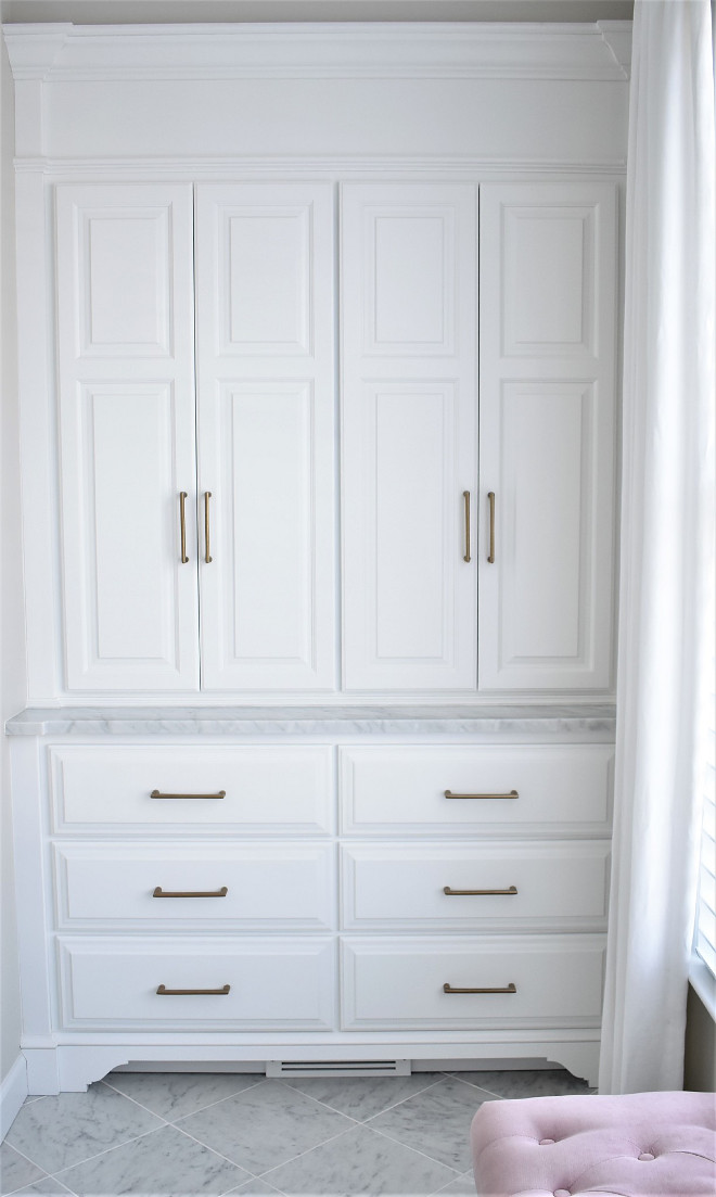 Linen Closet Doors with Brass Hardware and Carrera Marble. Opposite the vanity we had a small space that really wasn't going to be used well so we had a custom storage dresser made again adding the all important storage but making it look like a beautiful piece of furniture. Linen Closet Doors with Brass Hardware and Carrera Marble. Linen Closet Doors with Brass Hardware and Carrera Marble. Linen Closet Doors with Brass Hardware and Carrera Marble #LinenCloset #LinenClosetDoors #Brass #Hardware #CarreraMarble Kate Abt Design