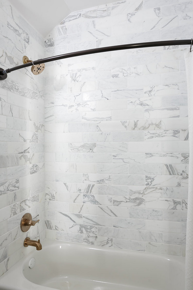 Marble Tile. Shower Marble Tile. Shower marble tile is The wall tile is New Ravenna Bricks 4 x 12 Calacatta Marble Timeworn. #marble #tile #newravenna #calacatta #showertile Ramage Company Leslie Cotter Interiors, LLC
