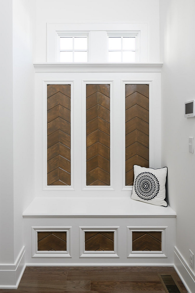 Mudroom. The mudroom built in is a custom design with stained inset chevron paneling. #mudroom #chevron #chevronpaneling #chevroninset Ramage Company. Leslie Cotter Interiors, LLC