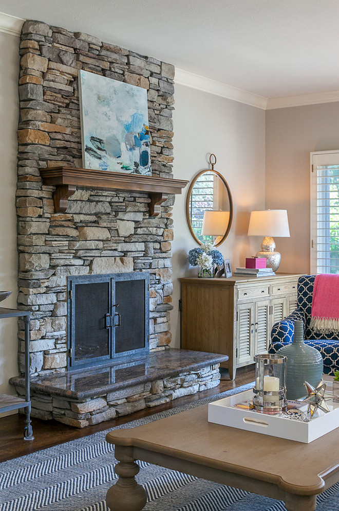 Stone Fireplace. Stone fireplace. This stacked stone fireplace features a granite slab at the ledge. Stacked stone fireplace and granite at the ledge. Stone Fireplace. Stone fireplace. Stacked stone fireplace and granite at the ledge #StoneFireplace #Stonefireplace #Stackedstonefireplace #granite #fireplaceledge Christine Sheldon Design