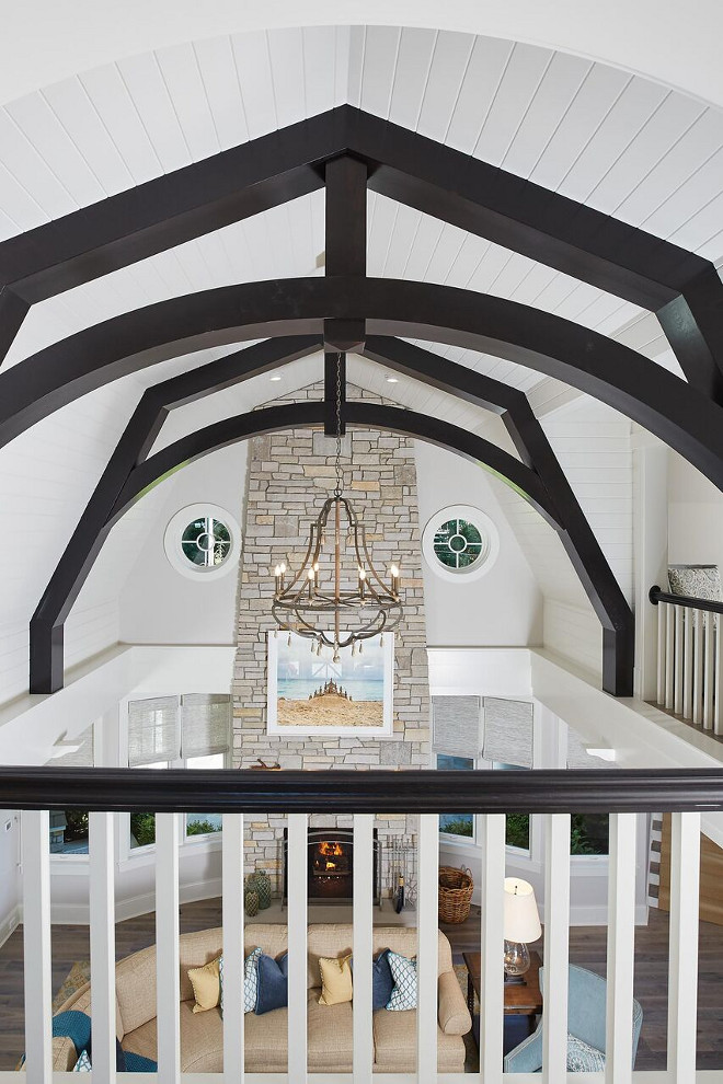 Vaulted Ceiling with Dark Beams and tongue and groove paneling. Floor to ceiling stone fireplace complements the Vaulted Ceiling with Dark Beams and tongue and groove paneling. Vaulted Ceiling with Dark Beams and tongue and groove paneling. Floor to ceiling stone fireplace complements the Vaulted Ceiling with Dark Beams and tongue and groove paneling ideas #VaultedCeiling #DarkBeams #tongueandgrooveceiling #tongueandgroovepaneling #Floortoceilingfireplace #stonefireplace #VaultedCeilings #VaultedCeilingDarkBeams #tongueandgroovepaneling Benchmark Wood & Design Studios - Mike Schaap Builders
