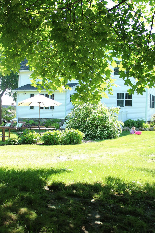 Backyard. Farmhouse Backyard. We replaced the roof, all of the windows, and added french doors to the back of the house as well. Backyard. Farmhouse Backyard #Backyard #FarmhouseBackyard Home Bunch's Beautiful Homes of Instagram @laura_willowstreetinteriors