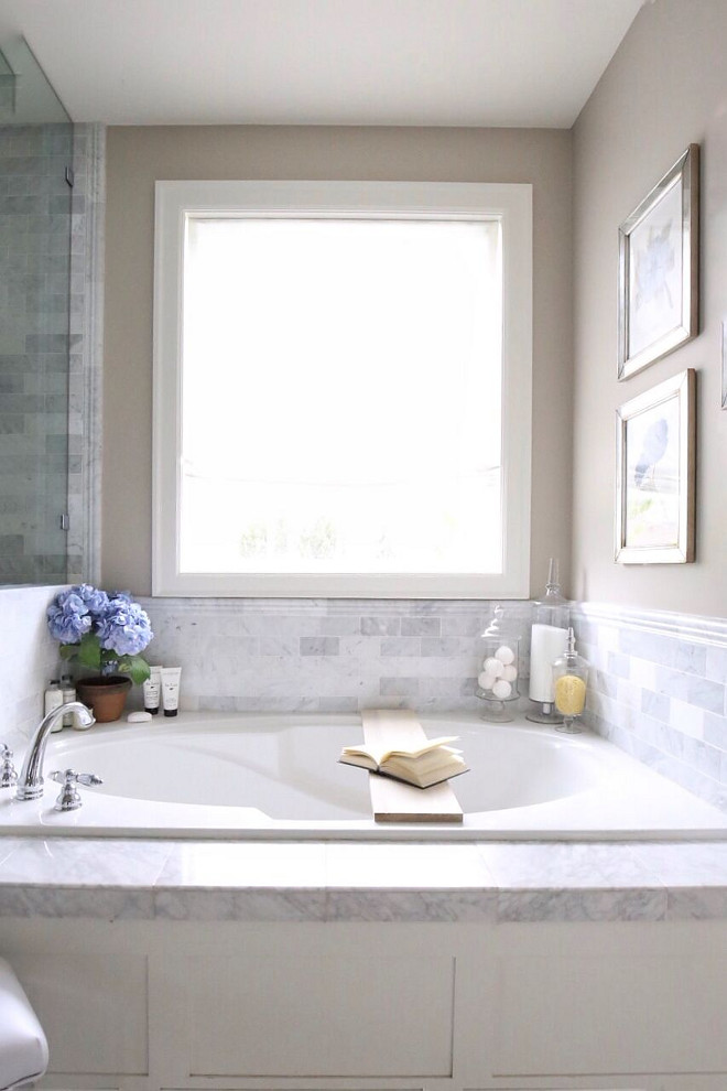 Bathtub Marble Tile. Bathtub Marble Tile. Bathtub Marble Tile. Carrera marble floors, and tile surrounds the walls and tub, giving the bathroom a spacious and airy feel. Bathtub Marble Tile. Bathtub Marble Tile #BathtubMarbleTile Home Bunch's Beautiful Homes of Instagram @cambridgehomecompany