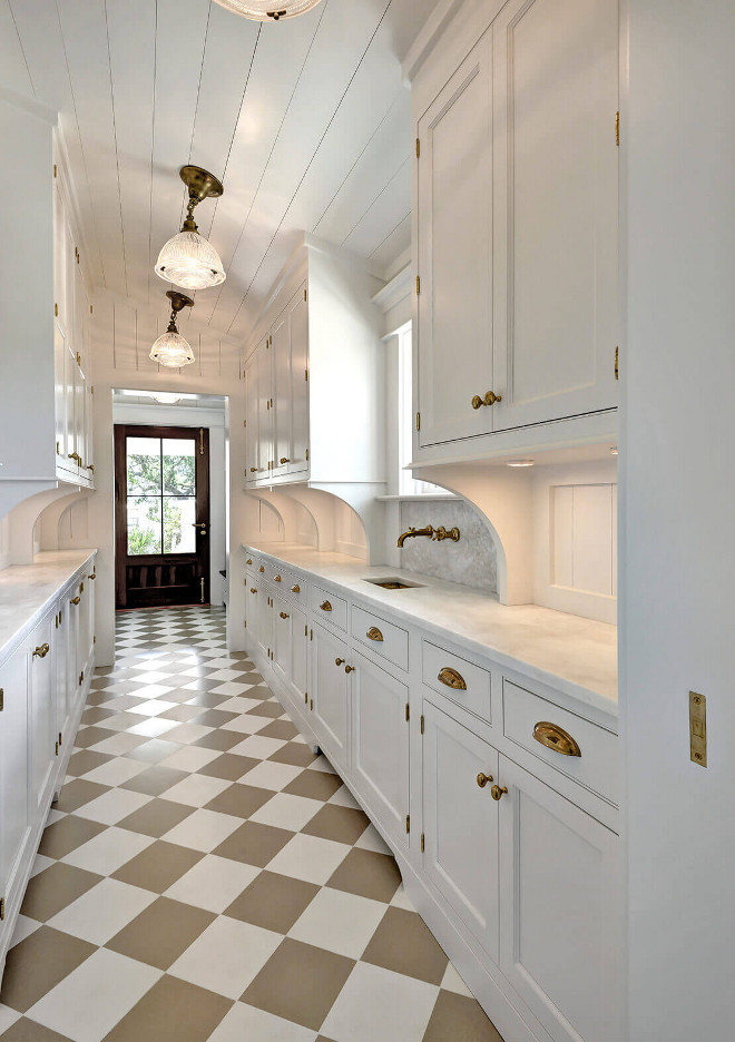 Butlers pantry with white shaker cabinets, shiplap ceiling and unlacquered brass hardware and brass wall-mounted faucet. Flooring is American Olean Porcelain and Custom Tiles. Mahogany door at mudroom entrance. Butlers pantry with white shaker cabinets, shiplap ceiling and unlacquered brass hardware and brass wall-mounted faucet #Butlerspantry #whiteshakercabinets #shiplap #shiplapceiling #unlacqueredbrass #brasshardware #wallmountedfaucet Robyn Hogan Home Design