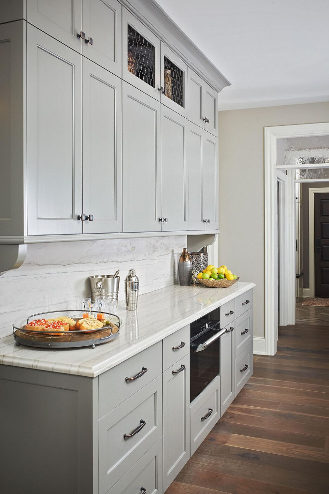 Chelsea Gray HC-168 Benjamin Moore. Chelsea Gray HC-168 Benjamin Moore Paint Color. Countertop and Backsplash White Macaubas quartzite. Chelsea Gray HC-168 Benjamin Moore Kitchen Cabinet Paint Color Chelsea Gray HC-168 Benjamin Moore #ChelseaGrayHC168BenjaminMoore #ChelseaGrayHC168 #ChelseaGrayBenjaminMoore #ChelseaGray #HC168 #BenjaminMoore #kitchen #cabinet #paintcolor #BenjaminMooregreypaintcolors #BenjaminMoorepaintcolors Mike Schaap Builders