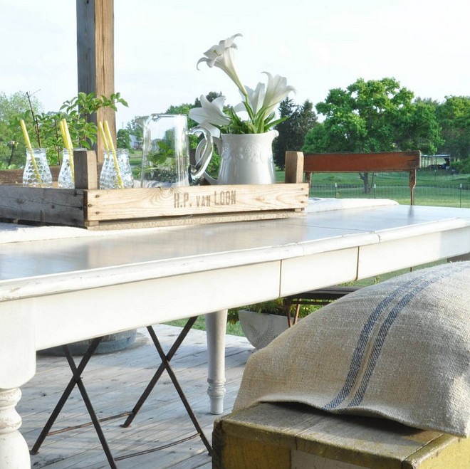 Farmhouse Back Porch Table and bench with burlap cushion. Home Bunch's Beautiful Homes of Instagram @becky.cunningham.home