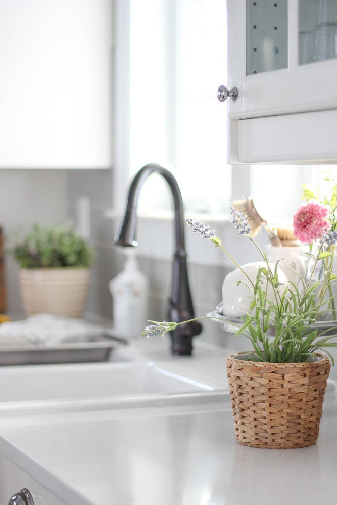 Farmhouse kitchen faucet Kohler Faucet. Faucet is Kohler. The countertop is Caesarstone in Organic White. #faucet #koh;er #farmhousefaucet Home Bunch's Beautiful Homes of Instagram @laura_willowstreetinteriors