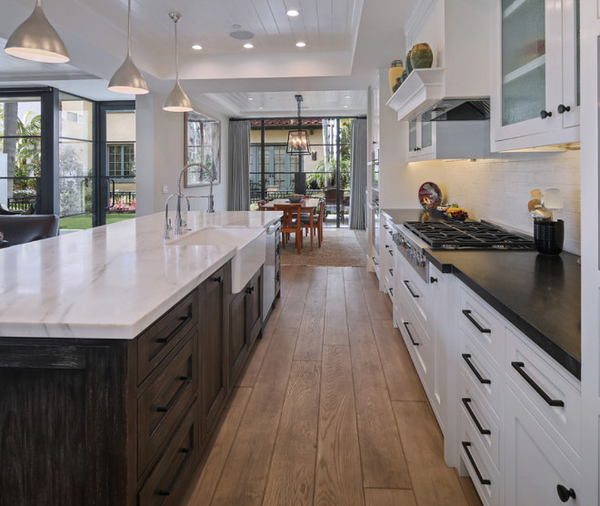 Kitchen Island and perimeter countertop ideas. The perimeter countertop is Hard Rock Granite with an honed finish and mitered edge. Classic combinataion of Island and perimeter countertop #Islandcountertop #perimetercountertop #countertopideas Patterson Custom Homes