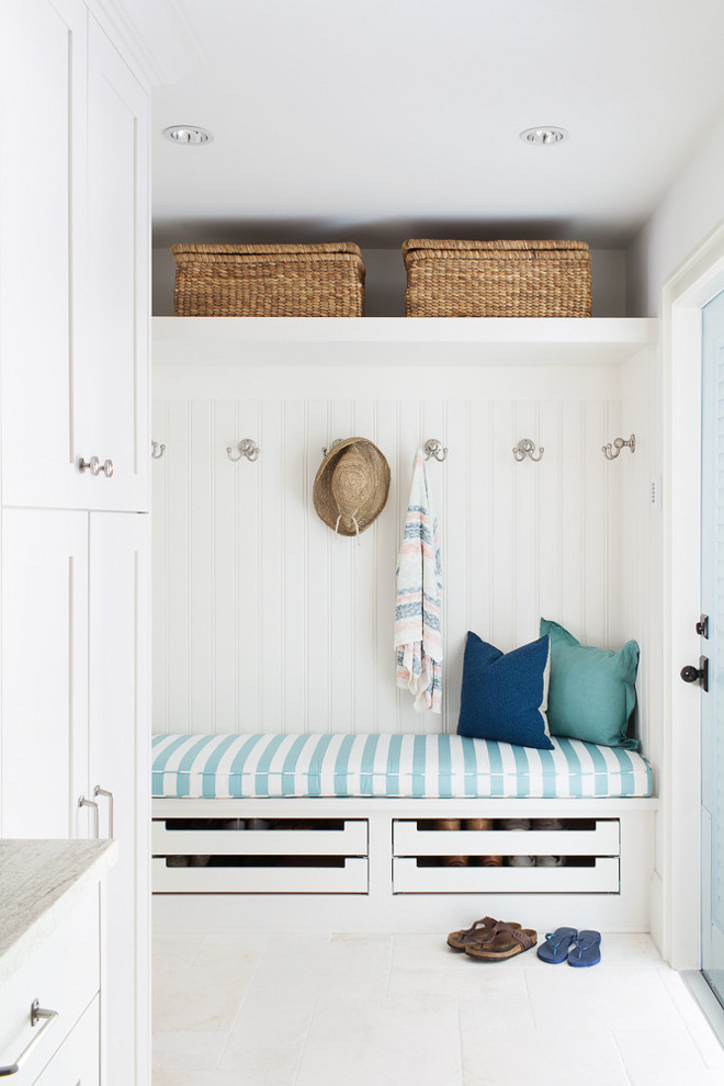 Mudroom Cubbies with beadboard paneling. Coastal mudroom with beadboard paneling and shoe drawers under built in bench. #mudroom #cubbies #beadboard #coastalmudroom #shoestorage #paneling Lischkoff Design Planning