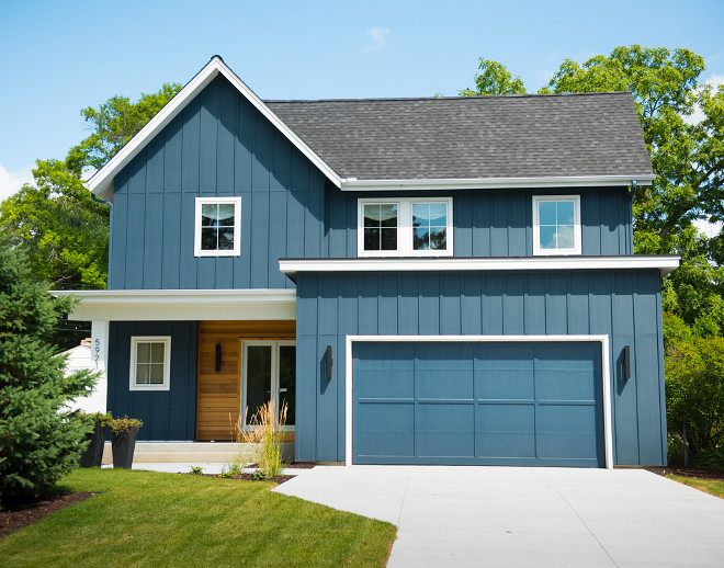 Navy Modern Farmhouse Exterior. The exterior also features board and batten and clear cedar lap siding. Navy Modern Farmhouse Exterior. Navy Modern Farmhouse Exterior #NavyModernFarmhouse #NavyModernFarmhouseExterior #ModernFarmhouseexterior #exterior Refined Custom Homes