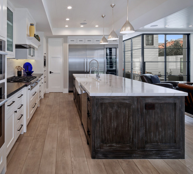 Pacific White Granite with an honed finish and mitered edge. Island Countertop is a white granite, Pacific White Granite with an honed finish and mitered edge #whitegranite #countertop #PacificWhiteGranite #honedgranite #miterededge Patterson Custom Homes