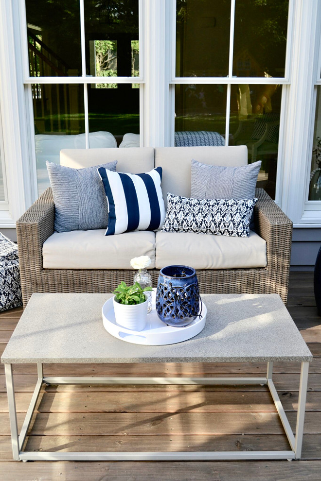 Patio Decor Ideas. Porch Stain: Cordovan Brown by Behr in Semi-Transparent Patio Furniture: Target Heatherstone Collection Lanterns: Ikea Pillows & Poufs: Target Striped Pillows: TJ Maxx. Home Bunch's Beautiful Homes of Instagram @sweetthreadsco