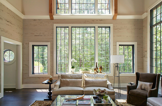 Pecky Cypress Shiplap. Neutral living room with Pecky Cypress shiplap and wall of windows. Living room Pecky Cypress Shiplap and black steel windows. Pecky Cypress Shiplap Pecky Cypress Shiplap #PeckyCypressShiplap #PeckyCypress #Shiplap #blackwindows #blacksteelwindows Christopher Architecture & Interiors