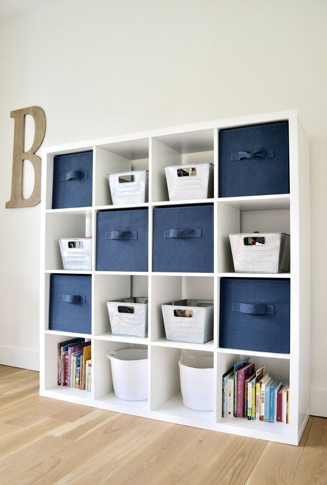 Playroom Storage Ideas. Bookcase is from Ikea. Blue and white Playroom Storage Ideas #blueandwhiteplayroom #playroom #storage #playroomstorage Home Bunch's Beautiful Homes of Instagram @sweetthreadsco