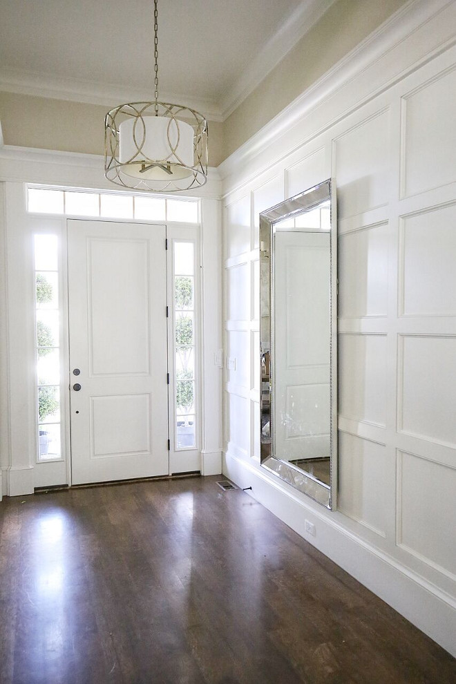 Trimmed in wall paneling. Foyer Trimmed in wall paneling. Foyer Trimmed in wall paneling #Trimmedwallpaneling #Trimmedpaneling Home Bunch's Beautiful Homes of Instagram @cambridgehomecompany