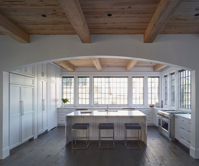 White kitchen with black steel windows, no upper cabinets and Pecky Cypress shiplap ceiling. White kitchen with black steel windows, no upper cabinets and Pecky Cypress shiplap ceiling #Whitekitchen #blacksteelwindows #nouppercabinets #PeckyCypress #shiplap #shiplapceiling