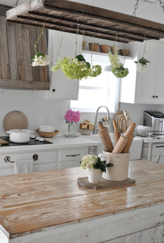 Whitewashed Kitchen Island. Distressed farmhouse kitchen with Whitewashed Kitchen Island. Whitewashed Kitchen Island #WhitewashedKitchenIsland #KitchenIsland Home Bunch's Beautiful Homes of Instagram @becky.cunningham.home
