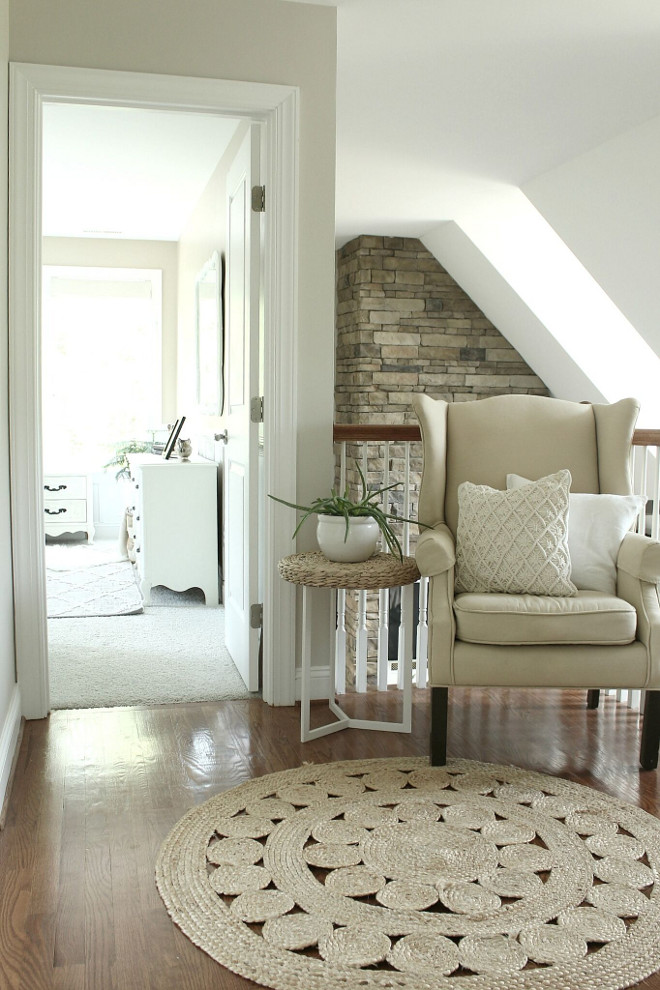 Neutral Landing area ideas. Neutral Landing area with chair, accent table and roud sisal rug. Neutral Landing area ideas #NeutralLanding Beautiful Homes of Instagram @middlesisterdesign - Home Bunch