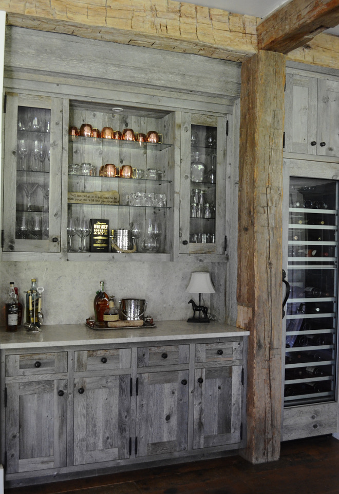 Barnwood bar. Rustic reclaimed wood bar cabinet. This custom designed bar is made from reclaimed barn wood. We also added a Thermador wine column with a reclaimed wood door panel. Rustic reclaimed wood bar cabinet. Rustic reclaimed wood bar cabinet. Rustic reclaimed wood bar cabinet #Rusticreclaimedwoodbarcabinet #Rusticreclaimedwood #barcabinet #Rusticr #eclaimedwood #bar #cabinet Beautiful Homes of Instagram @SanctuaryHomeDecor