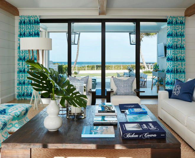 Beach House Living room with shiplap, black steel folding patio doors and blue, white and turquoise decor. Beach House Living room with shiplap, black steel folding patio doors and blue, white and turquoise decor #BeachHouse #Livingroom #shipla #blacksteelfoldingpatiodoors #foldingpatiodoors #blackfoldingpatiodoors #steelfoldingpatiodoors #blueandwhite #turquoisedecor Pineapples Palms, Etc