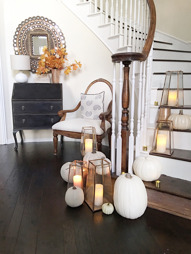 Fall Foyer Decor. Fall lanterns and white pumpkins foyer decorating ideas #falldecor #foyerfalldecor #foyer #lanters #whitepumpkins @thriftyniftynest