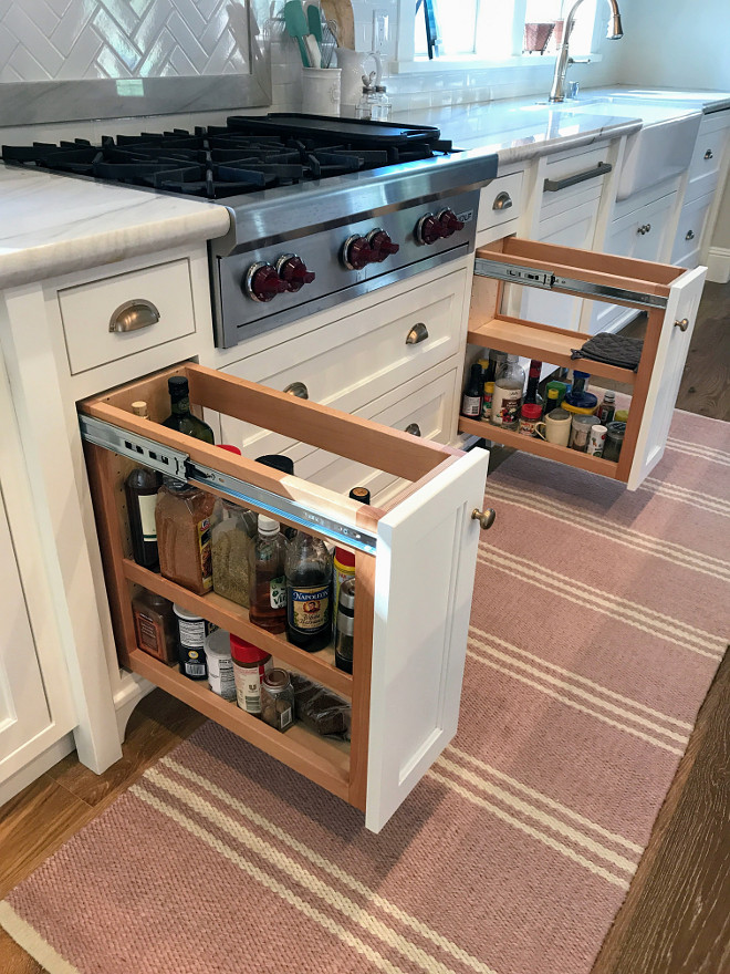 Kitchen Built In Spice Racks. Kitchen pull out spice rack ideas. These pull out racks flank the cooktop and are perfect to store cooking oils and spices. Kitchen Spice and Oil Pull Out Racks flanking range #BuiltInSpiceRacks #kitchenBuilt #SpiceRacks #PullOutspiceRacks Home Bunch Interior Design