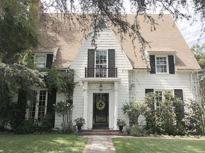 Exterior Paint is Dunn Edwards Swiss Coffee and the black shutters and door is Dunn Edwards Black.Beautiful Homes of Instagram @my100yearoldhome