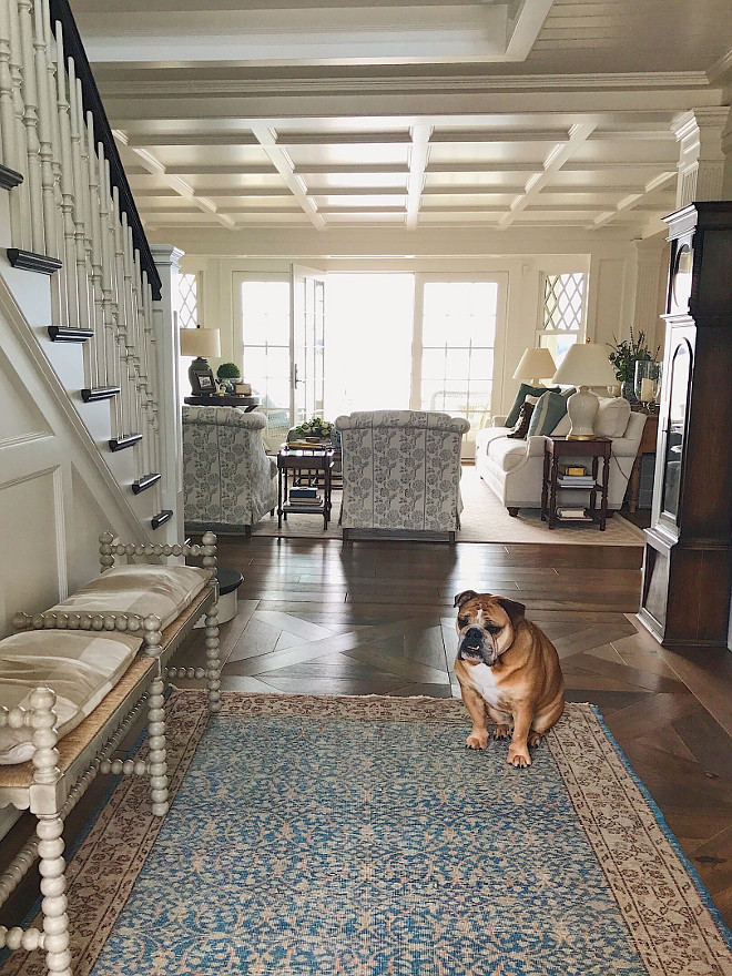 Foyer Decor. Foyer with vintage rug and spindle bench. Spindle bench is from Francis King showroom. Cushion in Schumacher plaid. Foyer decor #foyer #decor #foyerdecor #vintageryg #spindlebench #foyerbench Beautiful Homes of Instagram @SweetShadyLane