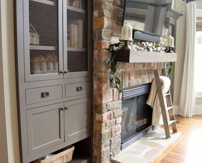 Living room cabinets flank stone fireplace. Living room cabinets paint color is Sherwin Williams Urbane Bronze SW 7048. Living room cabinets flank stone fireplace. Living room cabinets paint color is Sherwin Williams Urbane Bronze SW 7048. Living room cabinets flank stone fireplace. Living room cabinets paint color is Sherwin Williams Urbane Bronze SW 7048. Living room cabinets flank stone fireplace. Living room cabinets paint color is Sherwin Williams Urbane Bronze SW 7048. Living room cabinets flank stone fireplace. Living room cabinets paint color is Sherwin Williams Urbane Bronze SW 7048. Living room cabinets flank stone fireplace. Living room cabinets paint color is Sherwin Williams Urbane Bronze SW 7048 #Livingroomcabinets #cabinets #paintcolor #SherwinWilliamsUrbaneBronzeSW7048 Home Bunch Beautiful Homes of Instagram @mygeorgiahouse