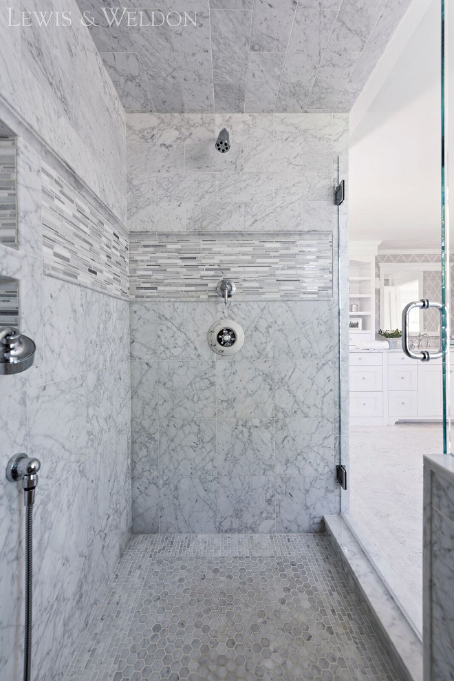 Marble Shower Tile Combination Ideas. The shower combines many different sizes of carrara marble tile from floor-to-ceiling. Marble Shower Tile Combination Ideas. Marble Shower Tile Combination Ideas. Marble Shower Tile Combination Ideas. Marble Shower Tile Combination Ideas #MarbleShowerTileCombination #MarbleShowerTileCombinationIdeas Lewis & Weldon Custom Kitchens